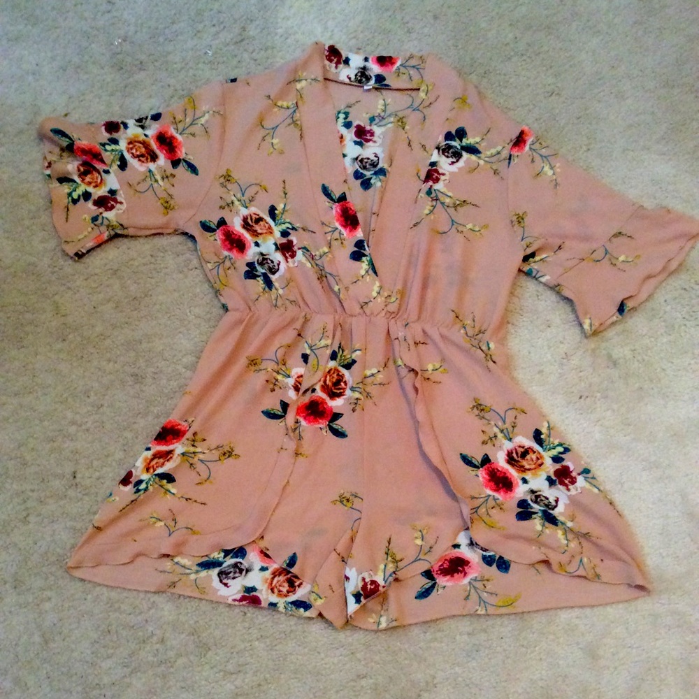 Sexy XL romper. Floral design and V cut